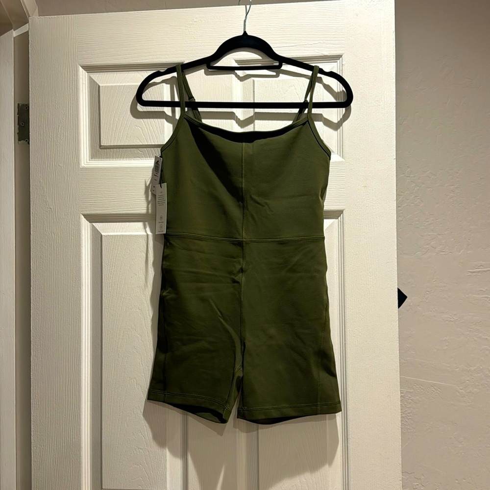 Aritzia divinity romper in green. Brand new with tags, never worn.
